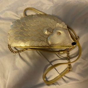 Kate Spade gold hedgehog purse, like new.